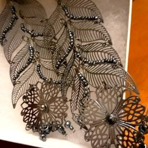 Filigree black costume earrings
